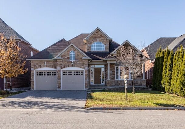 house in a suburban area with garden and trees