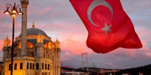 Turkish flag in front of the Hagia Sophia at sunset