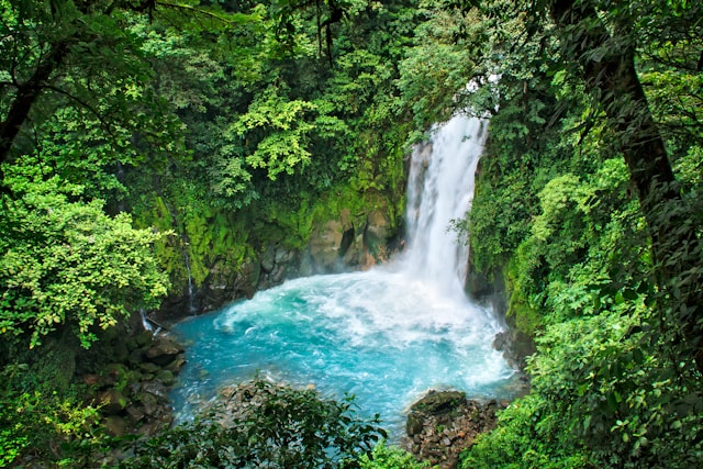 Celeste river waterfall in Costa Rica - where to move to from the USA