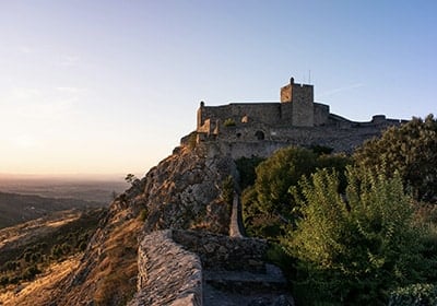 View of Marvao Castle on a hilltop in Portugal - how to move out of America