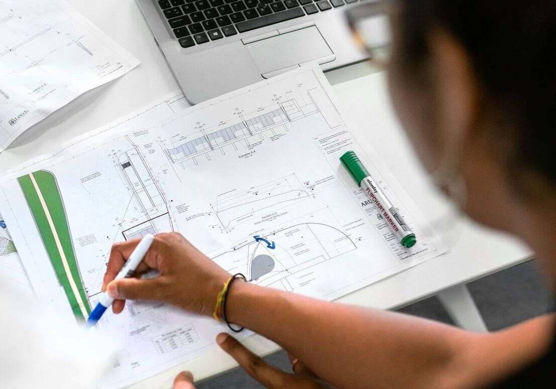 a woman working on a chart