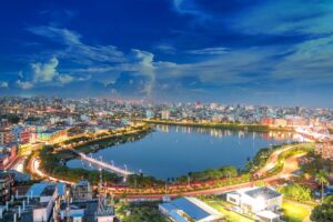 Vibrant view of nightlife on riverbank in Bangladesh - South Asian growing economy