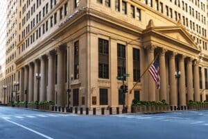View of Bank of America headquarters from street with American flag in front - best banks in the world