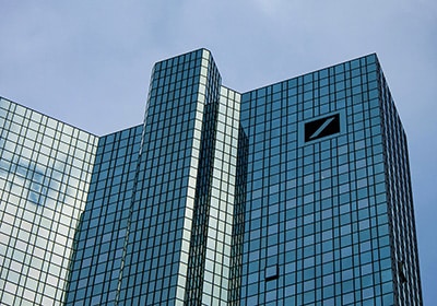Logo of Deutsche Bank on a tall office building - best banks on European continent