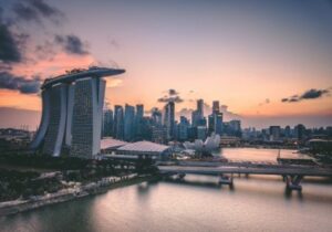 View of iconic Marina Bay Sands resort in Singapore at sunset - Singapore investment program