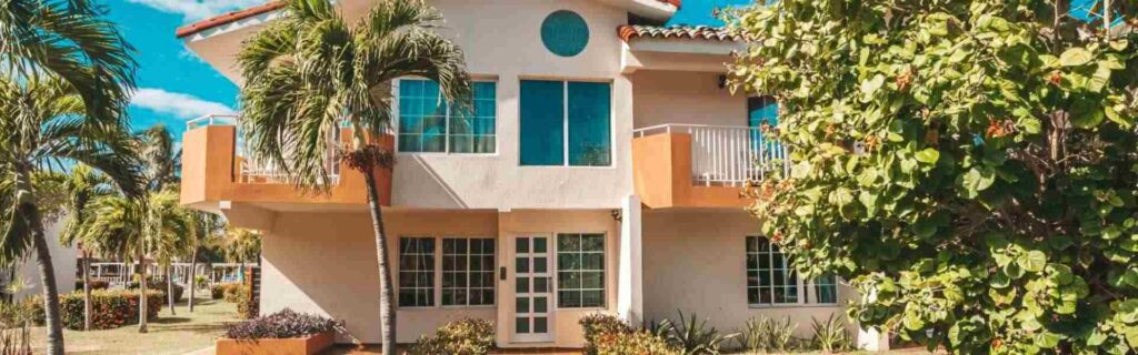 front view of a large house in jamaica