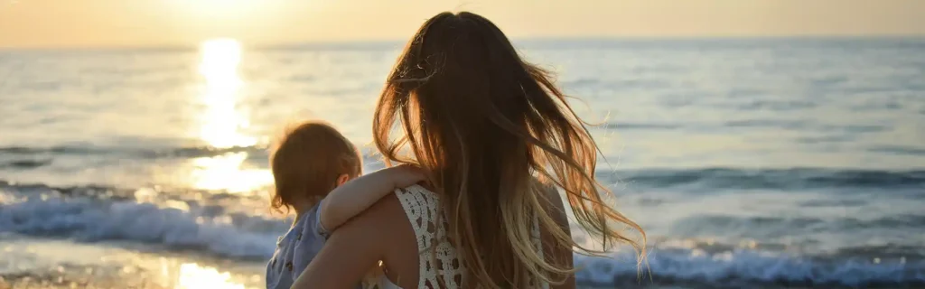 mother and a descendent son in a greek beach