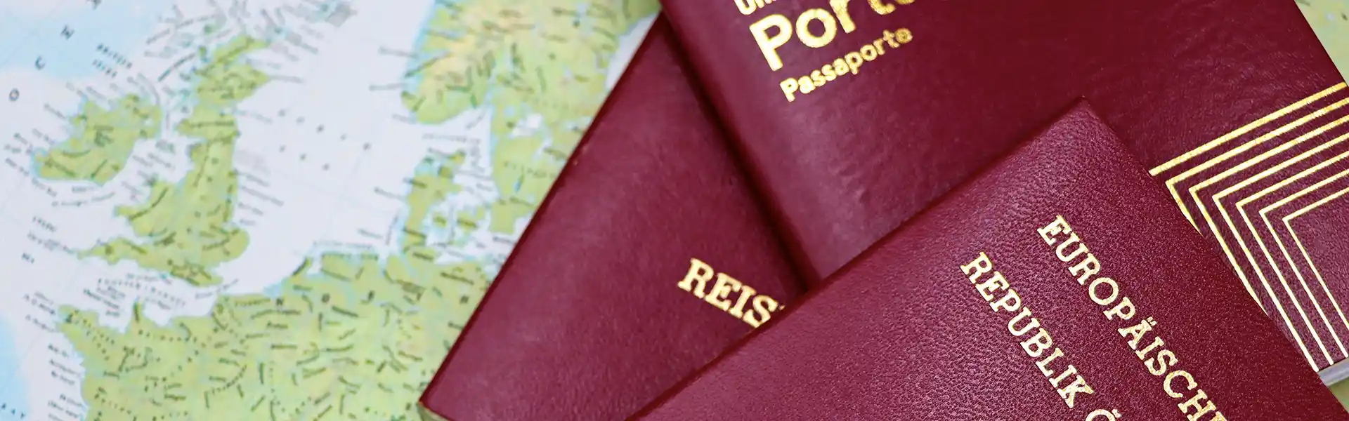 multiple passports over a map