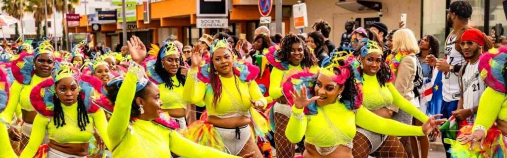 people in a parade at a carnival in st lucia