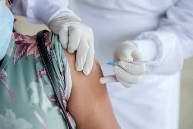 person receiving vaccination for travel to st lucia