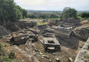 Ruins of troy turkey during the day with natural green landscape 