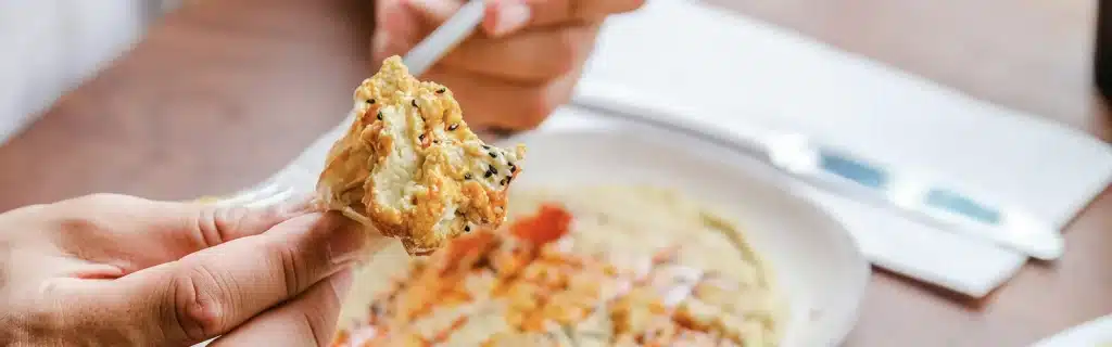 Person eating turkish food