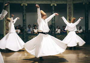 Dancers of the Whirling Dervish Ceremony turkey with white attire 