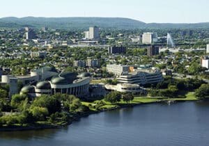 aerial view of Ottawa, Ontario, with a river running through it 