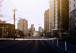 gray concrete road between high rise buildings during daytime Waterloo