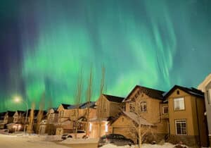 aurora borealis in a canada neighbourhood in winter