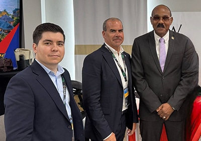 Joe Rice and Adalberto Pucca from Global Citizen Solutions with Prime Minister of Antigua and Barbuda Gaston Browne