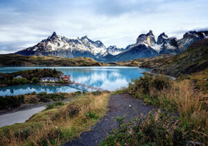 Snowcapped mountain range at the back of a lake in Chile - one of the safest countries in South America