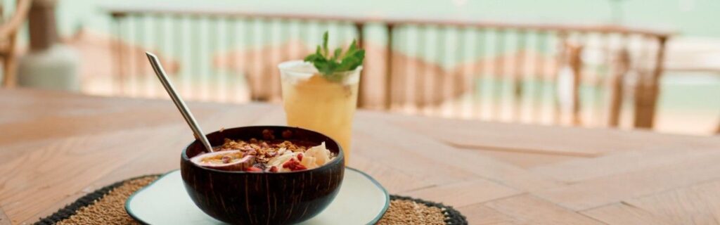 a dominican dish on a in a bow with seaview in the background