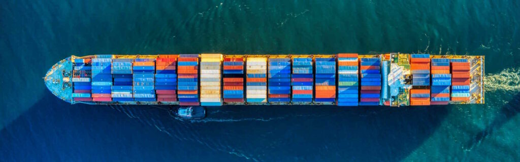 Container shipping places the vehicle inside a sealed container, where it is secured for transport.
