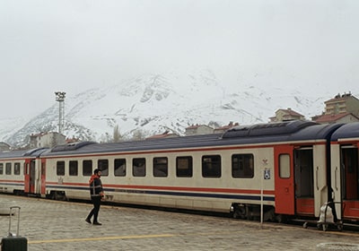 Turkey transportation: train in turkey with snow covered mountains 