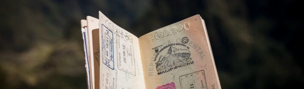 Top view of an open passport with stamps - Measuring the world's strongest passports