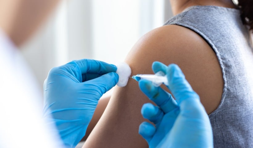 person receiving vaccination for travel to nauru