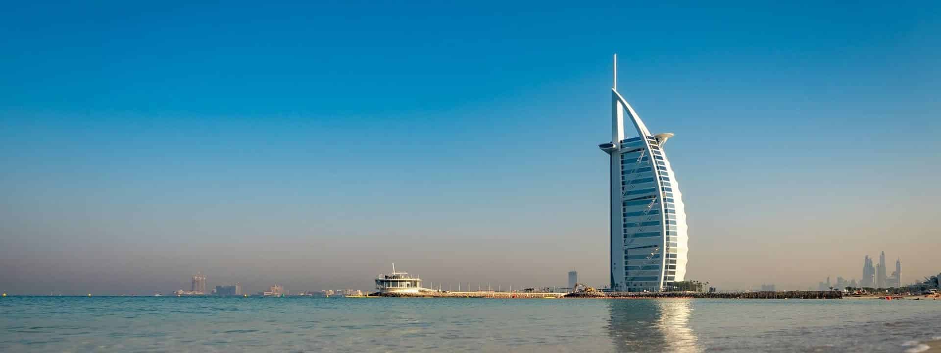 uae-building-in-a-bay-header-e1705571631289