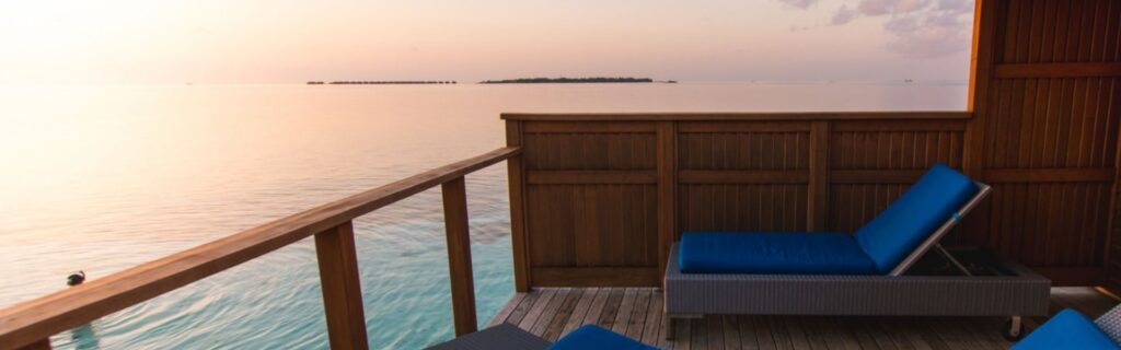 sunset view of the ocean from villa balcony in antigua