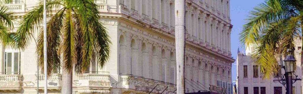 side view of traditional and colonial hotel in downtown havana, cuba