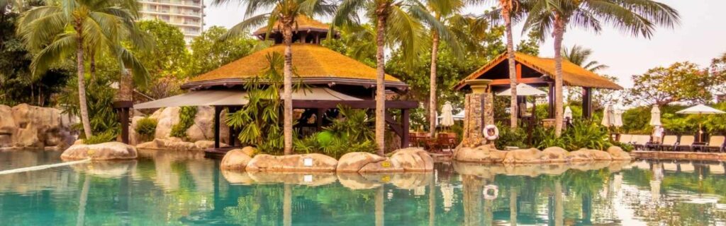 large pool and deck chairs at a boutique resort in st kitts
