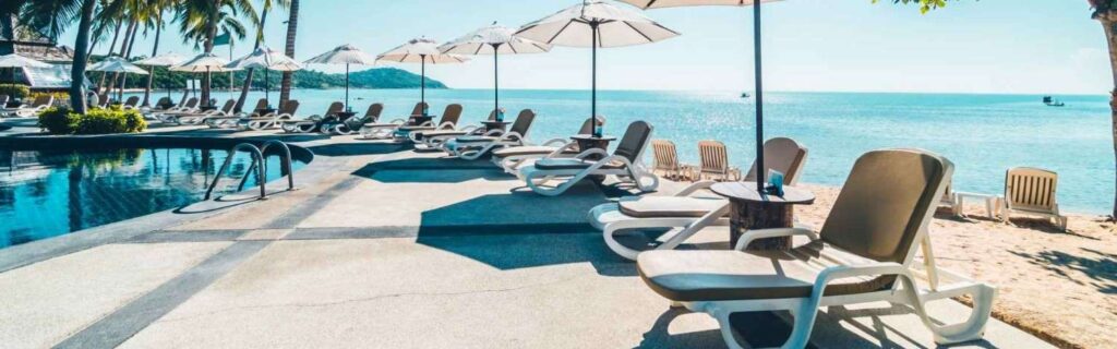 deck-chairs-and-a-pool-inside-a-grenada-luxury-resort