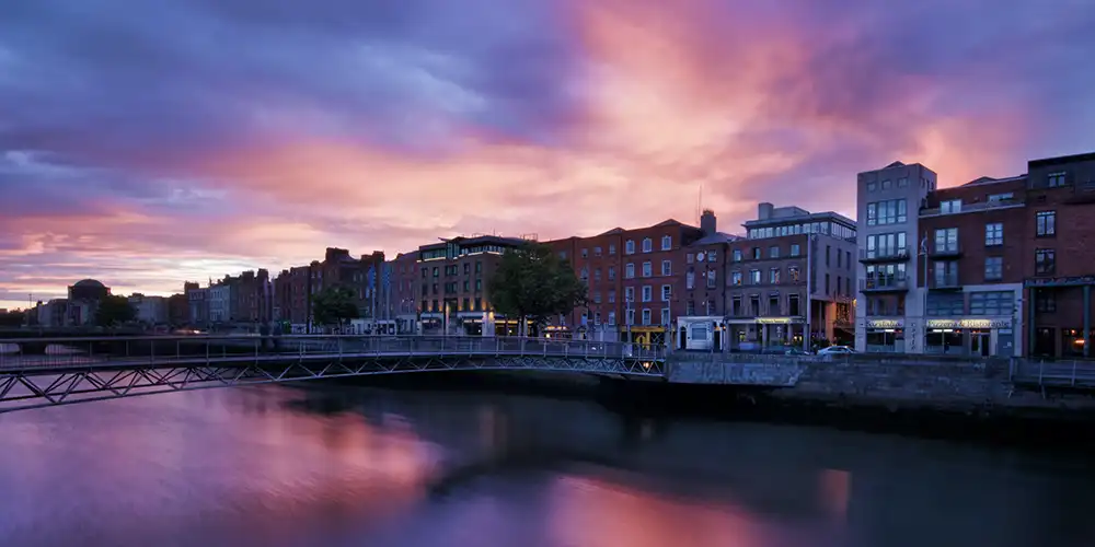 City of Dublin with a reddish purple sunset - best countries to raise a family
