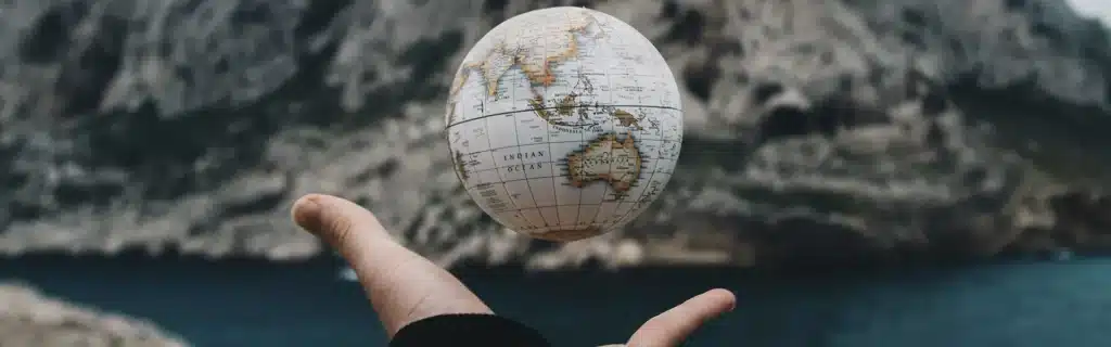 a person with a globe