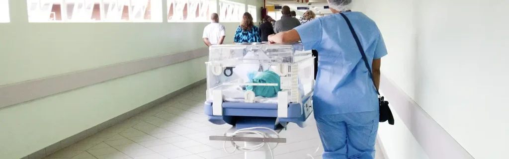 healthcare worker with a incubator on an hospital corridor for healthcare in Turkey 