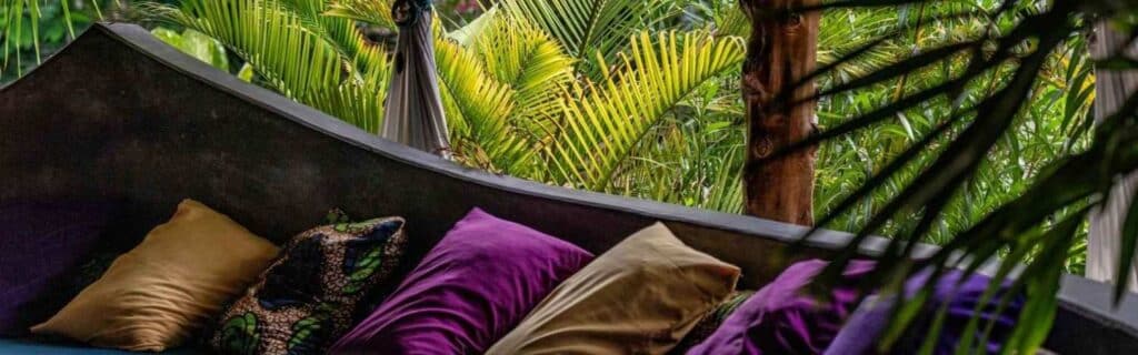 outdoor seating inside a jungle resort in grenada