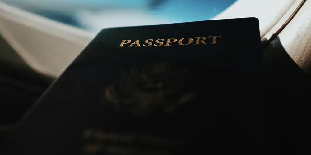 passport on an airplane window