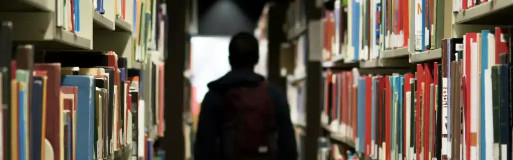 student in a school library