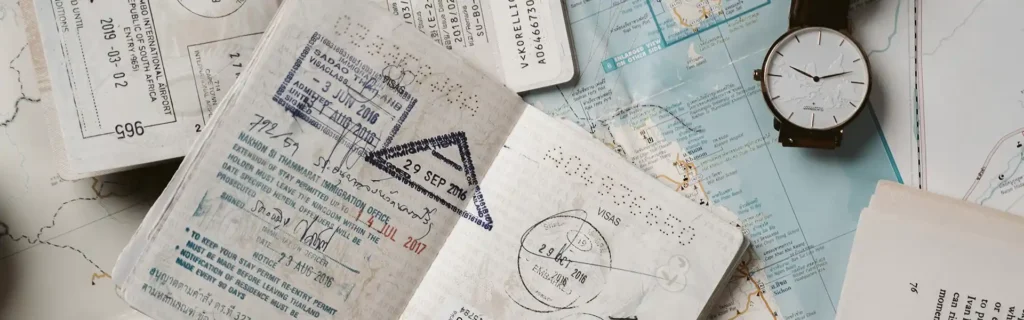 A couple of passports over a map