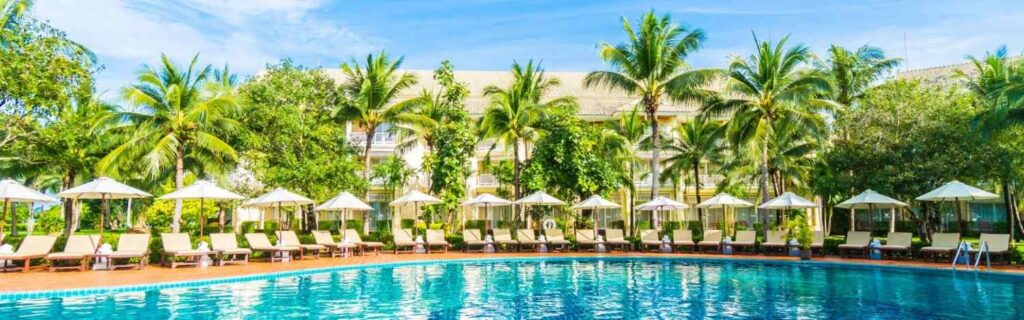 view of a large pool and deck chairs inside Holiday Inn Resort Vanuatu By IHG in vanuatu
