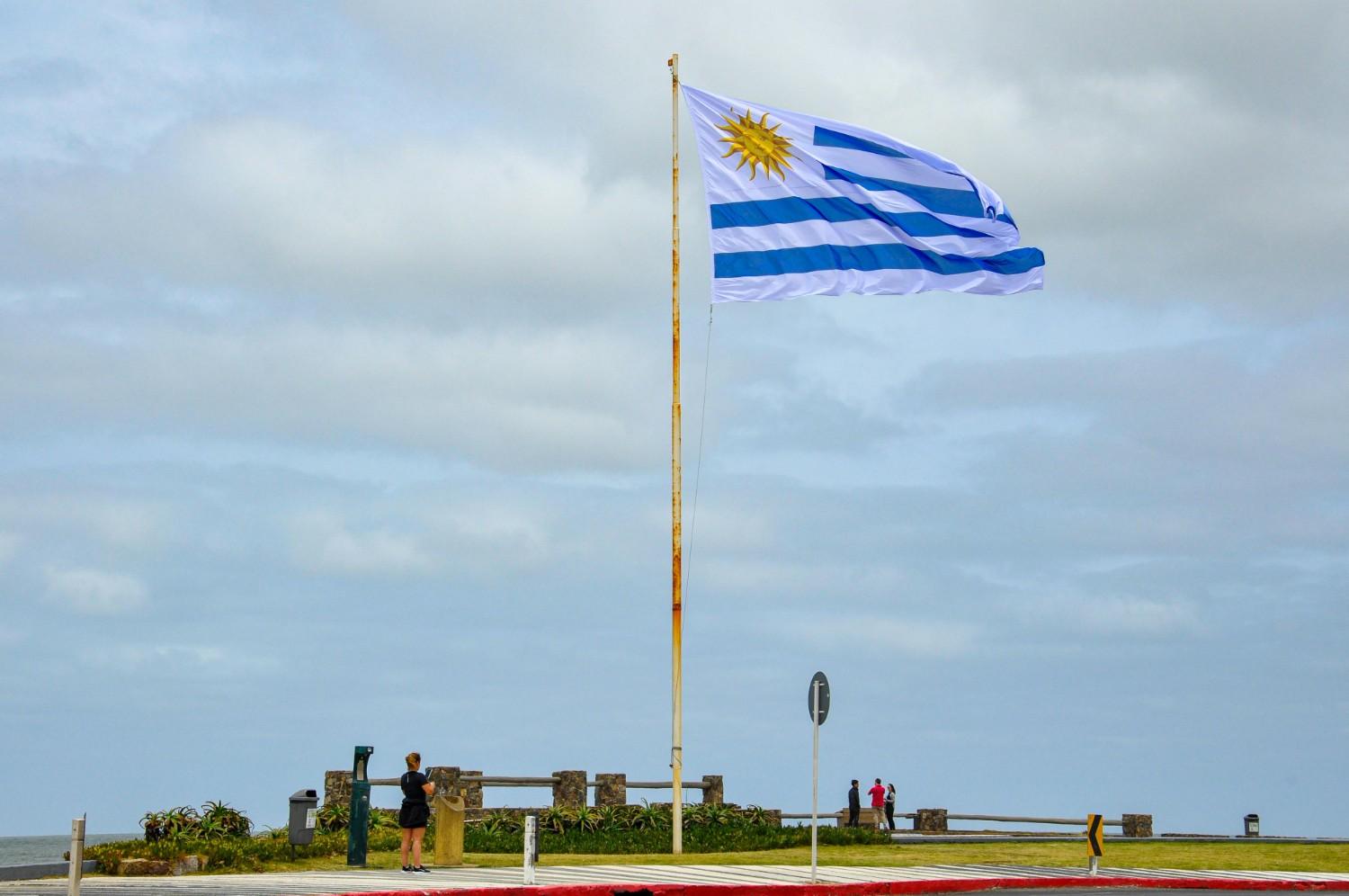 uruguay flag waving in the air