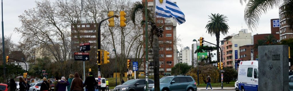 uruguayan flag and people walking on the street